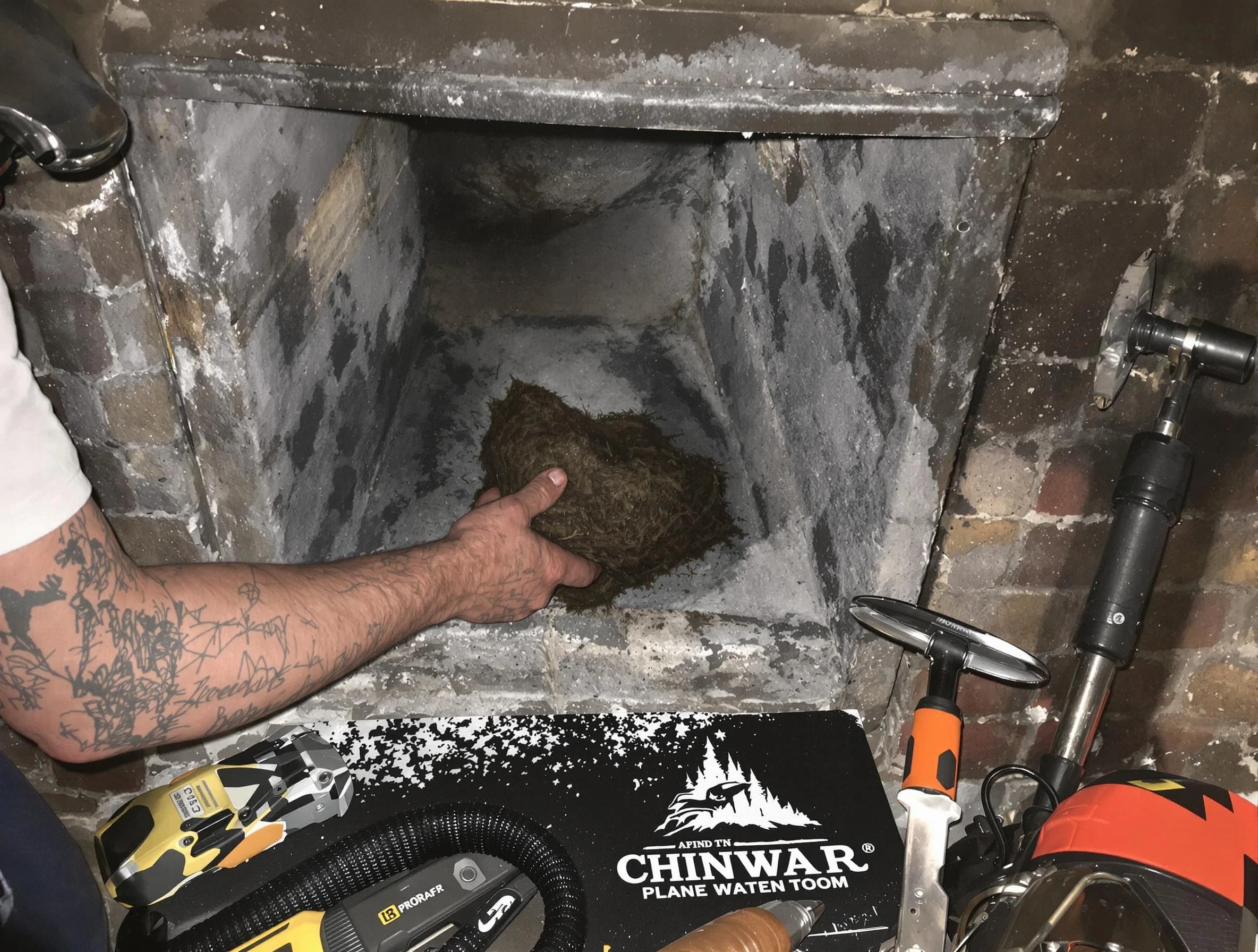 Dormont Chimney Sweep safely removing debris and screening chimney in Dormont, PA